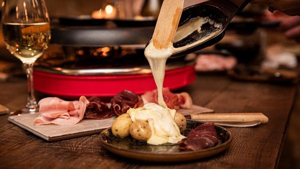 Sydney’s Raclette Igloo: A Cheesy Delight!